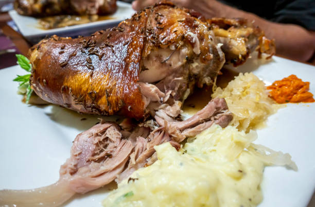 Roasted pork hock with some of the lean meat exposed
