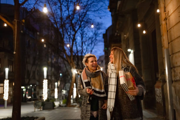 istock Couple walking a city, it's a Christmastime 1286110563