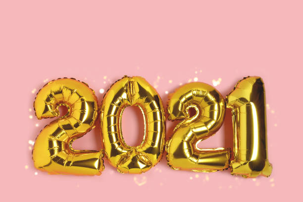 istock 2021 made from golden balloons with shiny bokeh. 1286112480