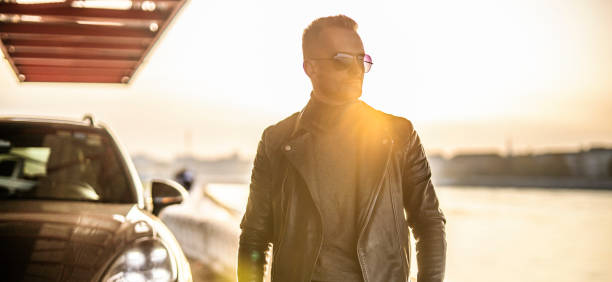Handsome man and his modern car