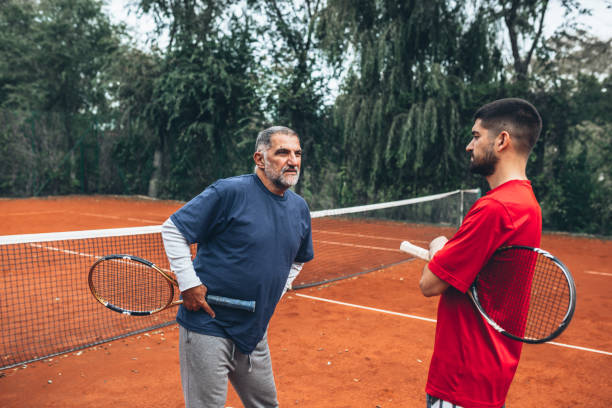 istock father and son tennis recreation 1286115739