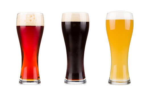 Realistic beer glasses isolated on white background. Mugs filled with red, dark and blond beer with bubbles and foam. Graphic design element for brewery ad, beer garden poster, flyers, printables.