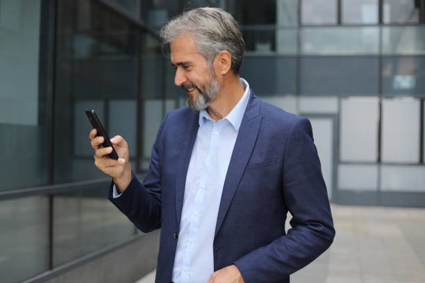 istock Businessman with smartphone 1286120852