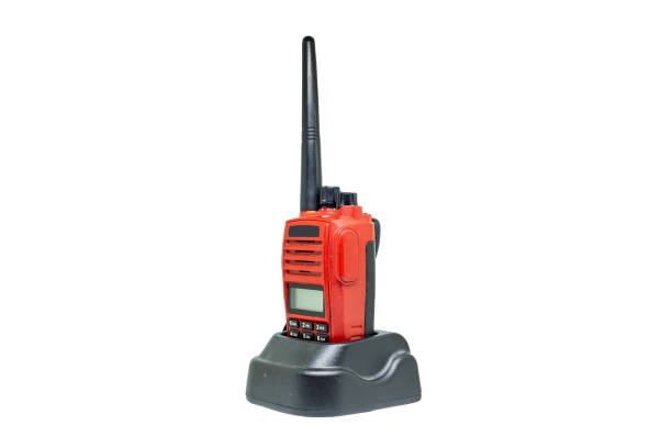 istock Red communication radio with charging cradle isolate on white background with clipping path. Walkie-Talkies with Battery charger on white background. 1286121941