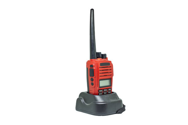istock Red communication radio with charging cradle isolate on white background with clipping path. Walkie-Talkies with Battery charger on white background. 1286121946