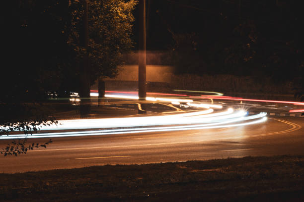 istock Car colorful night lights on road on long exposure 1286124061