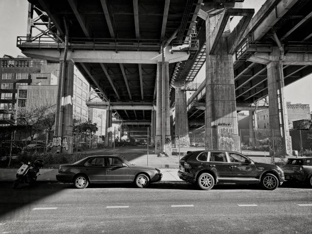 Under the Williamsburg Bridge Brooklyn, NY, USA - Nov 17, 2020: A view of the bridge from the underside a seen from Wyeth Avenue during the COVID-10 pandemic warren street brooklyn stock pictures, royalty-free photos & images