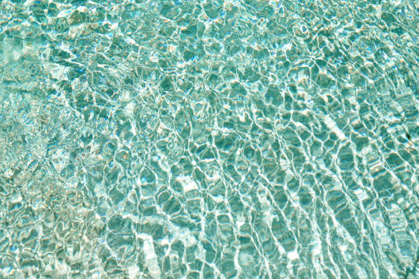 istock Ripple Water in swimming pool with sun reflection 1286126560