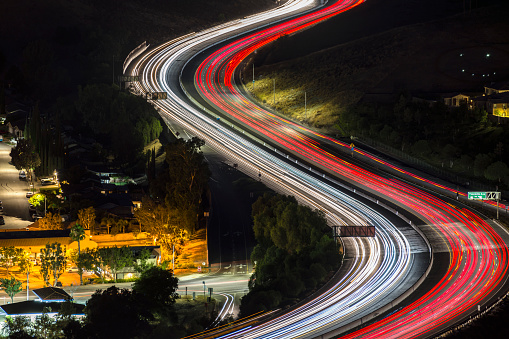 Night freeway commuters on route 118 in suburban Simi Valley near Los Angeles in Ventura County, California.