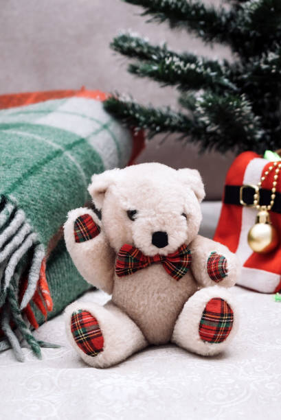 istock teddy bear and christmas decorations, checkered red green plaid 1286127858
