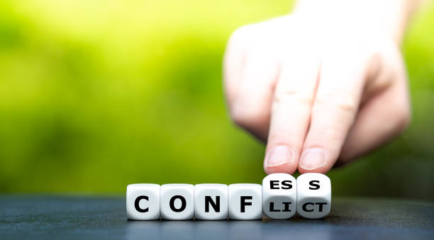 istock Hand turns dice and changes the word 