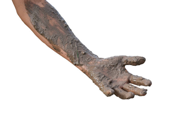 istock Hand covered with mud isolated on white background with clipping path. 1286128510
