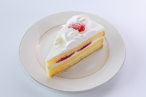 The image of Japanese Strawberry Shortcake (Layer cake) on plate in elegant mood.