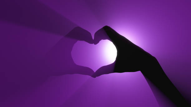 istock Hand gesture of love and respect. Ultraviolet light source in background 1286129786