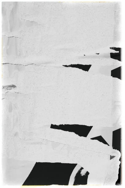 istock Old ripped torn paper crumpled creased posters grunge textures backdrop surface backgrounds placard Black and White 1286132114