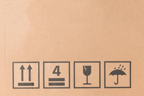 istock Black fragile sign icons on cardboard 1286132623