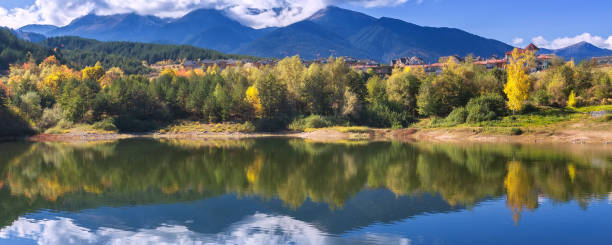 istock Bansko autumn banner with lake, Bulgaria 1286133558