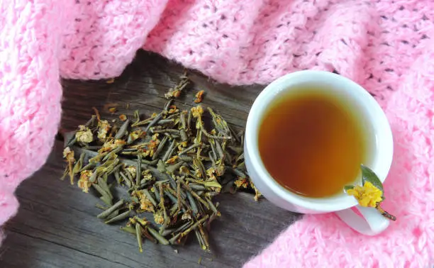 medicinal herb  sagan daila (Sagan Dali) and healing tea , selective focus, healing Siberian herb listed in the Red Book