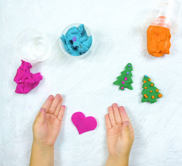 istock colored mass for modeling, decorative dough for children's creativity, baby made a heart 1286133686