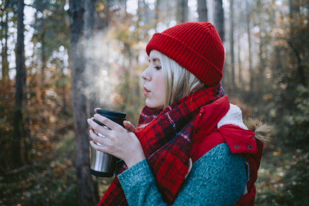 istock Woman backpacker in the forest taking a break 1286135042