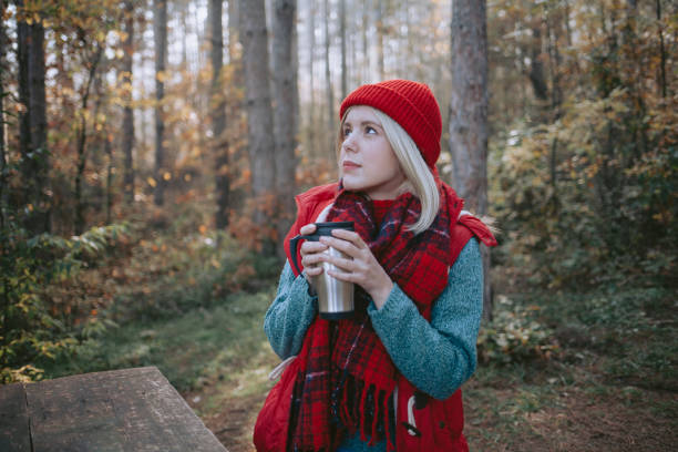 istock Woman backpacker in the forest taking a break 1286135049