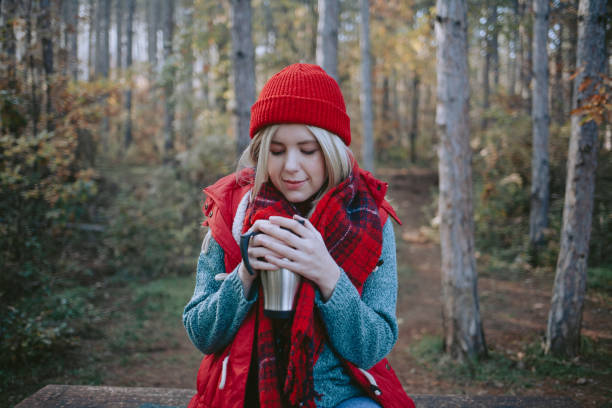 istock Woman backpacker in the forest taking a break 1286135050