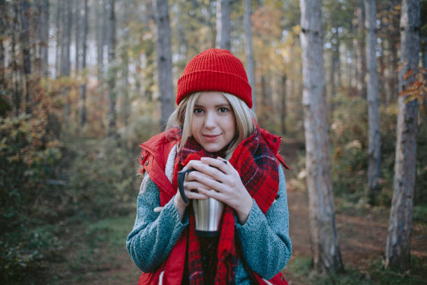 istock Woman backpacker in the forest taking a break 1286135061