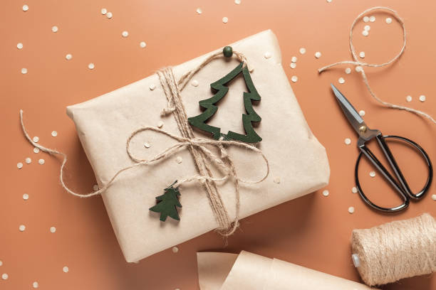 istock Gift box wrapped in craft paper with decor 1286135945