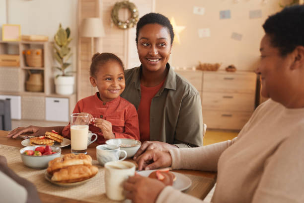 istock African-American Family Enjoying Breakfast 1286136347