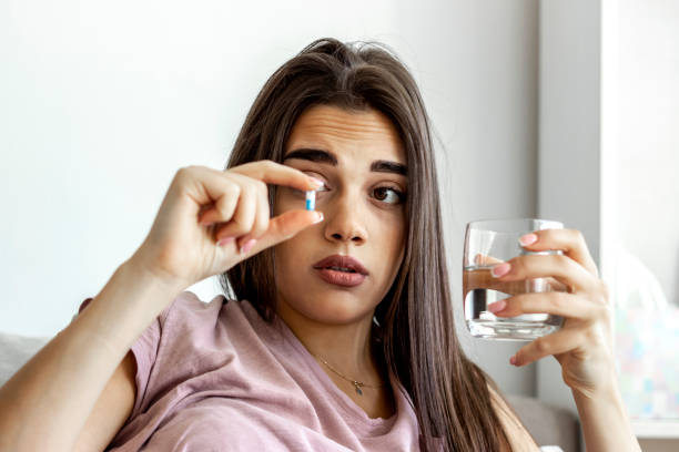 istock Taking my daily vitamin supplement. 1286139020