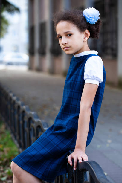 istock a girl 9-10 age sitting 1286139512