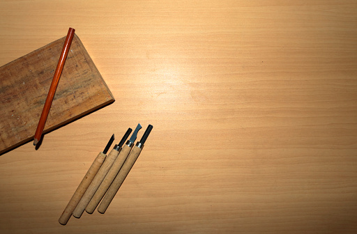 Tools for carving wood, pencil and wood