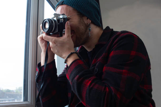 istock Young photographer taking photos 1286141060