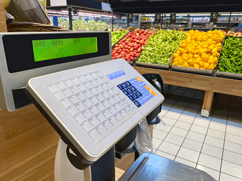 Weight scale and groceries in supermarket