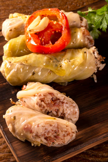 istock Arabic food. Appetizing cabbage rolls on wood background 1286144987