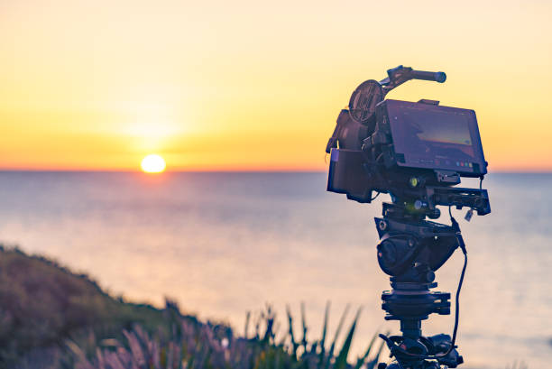 istock Camera take photo from sunrise over sea. 1286146149