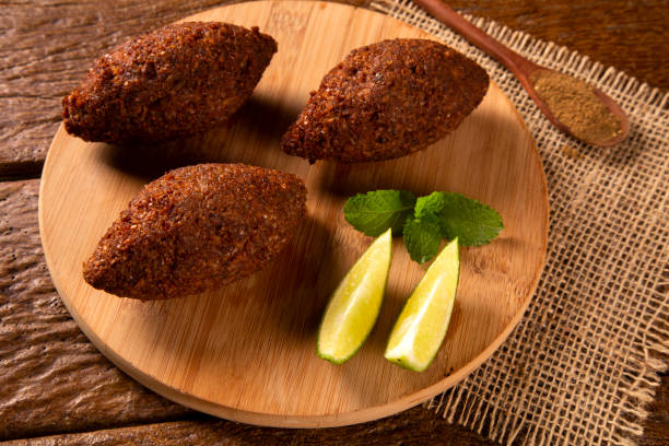 istock Kibbeh - Middle Eastern minced meat and bulghur wheat fried snack. Also popular party dish in Brazil (kibe). 1286146496