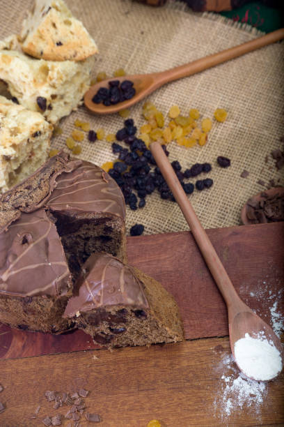 istock panettone and chocotone on rustic table. ingredients on the table 1286147354