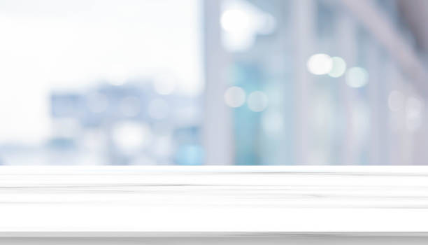 istock abstract blur inside office with modern perspective marble concrete table for show ads or promote product and content on display concept 1286147804