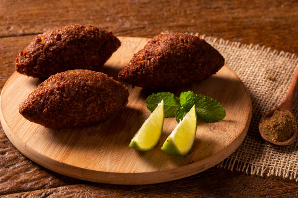 istock Kibbeh - Middle Eastern minced meat and bulghur wheat fried snack. Also popular party dish in Brazil (kibe). 1286148642