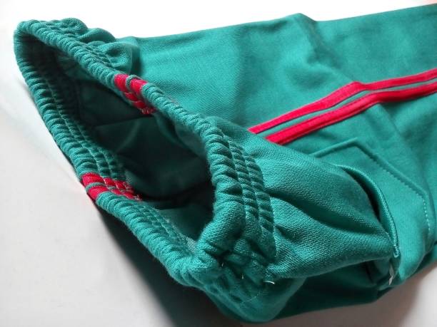 istock Turquoise green cotton trousers 1286150059