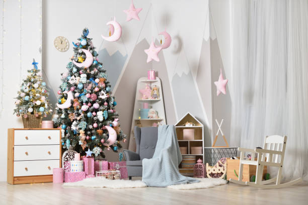 istock Christmas decorations with a Christmas tree in a bright children's bedroom 1286151648