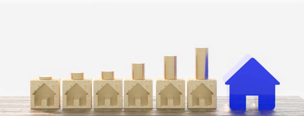 istock Mortgage concept. Wooden house model with copyspace. 3d rendering 1286153032