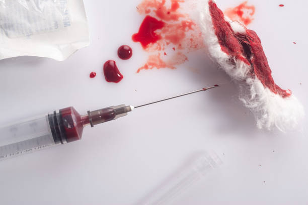 a blood syringe, with drops of blood, and traces after the use of injectable drugs. the concept of transmission borne infection through blood, to get infected with hepatitis c virus - pathogen imagens e fotografias de stock