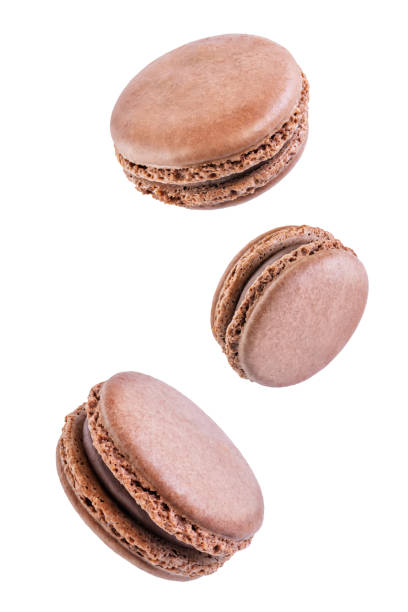 istock Chocolate Macarons with chocolate filling on a white isolated background 1286154268