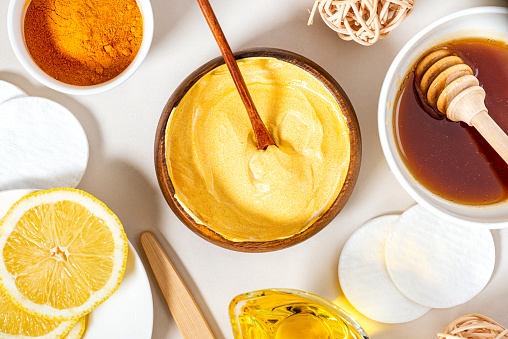 This homemade face mask is made with turmeric, yoghurt and honey. Ayurvedic skin care. Beauty, homemade skin care concept