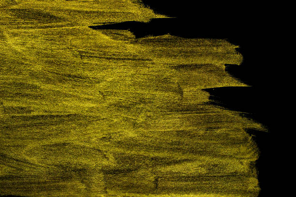 istock Abstract Hand-painted Art gold on black background 1286159469