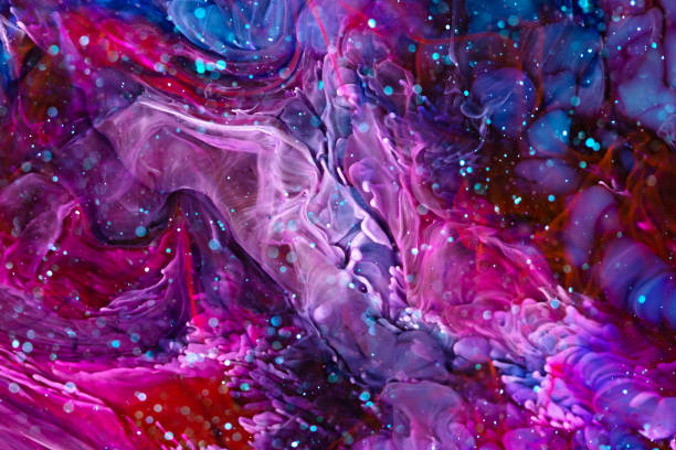 istock Epoxy resin texture with pink, blue and red colors. Liquid backdrop with splashes and ripples. Modern abstract artwork with splatter inks. Bright colors mixes on macrophotography wallpaper. 1286162343