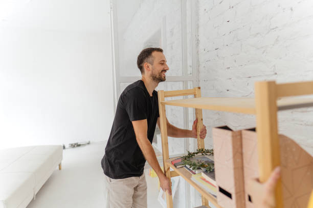 istock Young man moving into a new apartment 1286162750