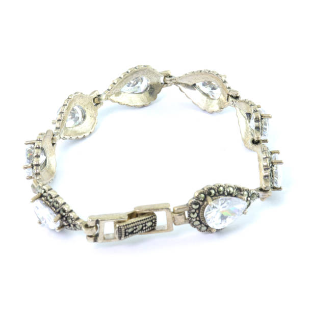 istock Stone-embroidered silver bracelet for women on a white background 1286165468